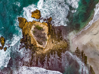 High angle view of waterfall in sea