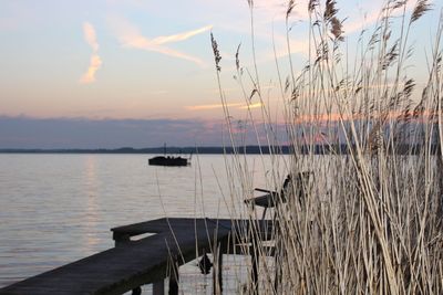 Scenic view of lake against sky during sunset