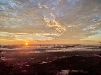 Scenic view of dramatic sky during sunset