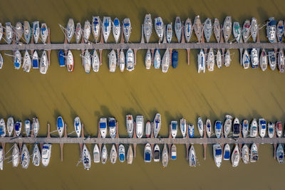 Directly above shot of boats moored in sea