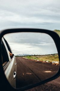 Country road seen through car windshield