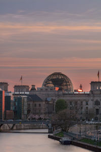 View of cityscape against sky during sunset