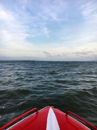 Boat in sea against sky