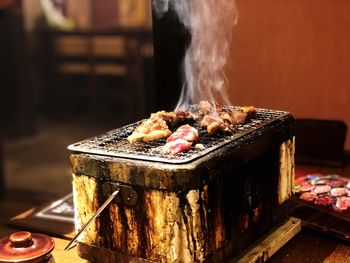 Close-up of meat on barbecue grill