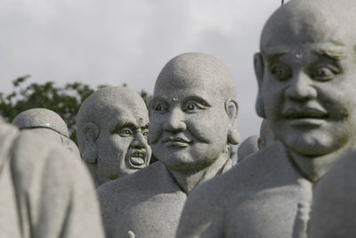 Close-up of statues at lohan temple
