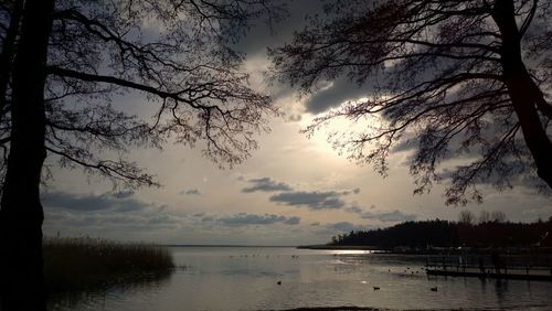 Scenic view of sea against sky at sunset