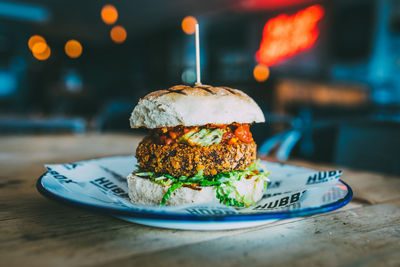 Close-up of burger in plate on table