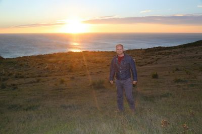 Scenic view of sea at sunset