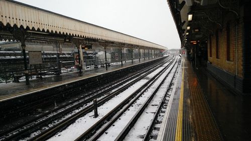 Empty railroad station platform in winter