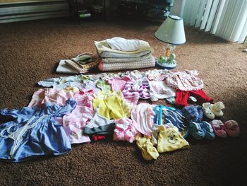 High angle view of various balls on bed at home