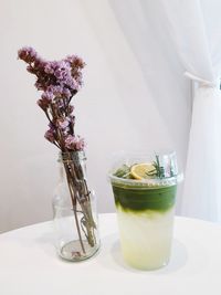 Close-up of flower vase on table