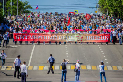 People walking on street in city