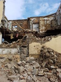 Low angle view of old building against sky