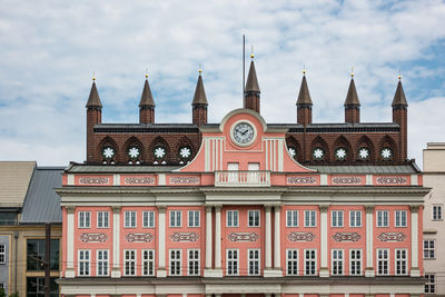 View of building against cloudy sky