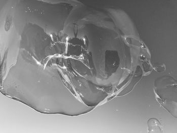 Close-up of water over white background