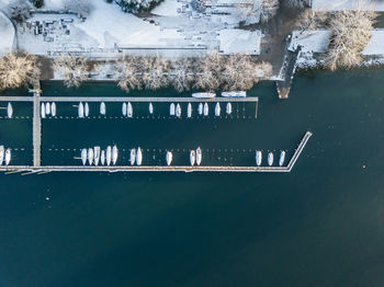 Aerial view of yachts moored at harbor