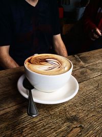 Coffee cup on table