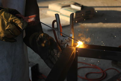 Man working on metal