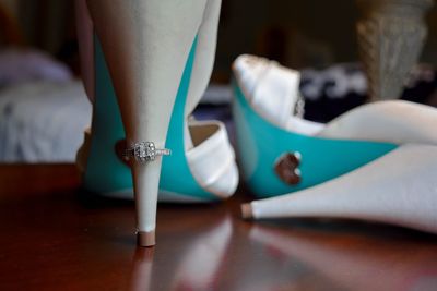 Close-up of high heels on floor