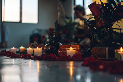 Close-up of candles decoration on table at meditation group