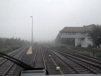 Railroad track in foggy weather