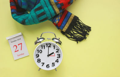 Close-up of clock on wall