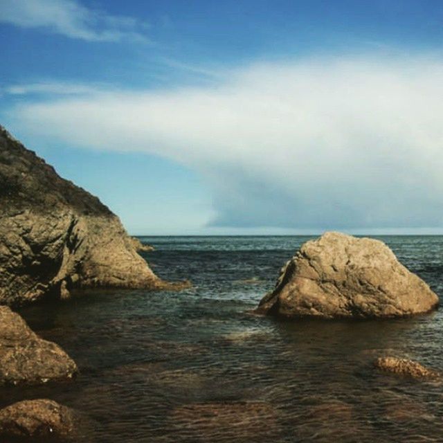 sea, water, scenics, tranquil scene, horizon over water, tranquility, beauty in nature, sky, rock - object, nature, rock formation, waterfront, idyllic, rock, cloud - sky, rippled, remote, outdoors, cloud, seascape