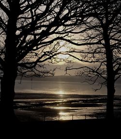 Scenic view of sea against sky at sunset