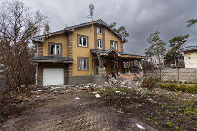 Destroyed buildings on the streets of irpen. broken windows. buildings after being hit by missiles.