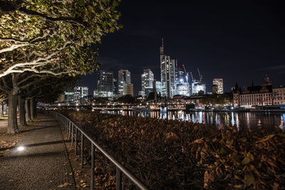 Illuminated buildings in city at night