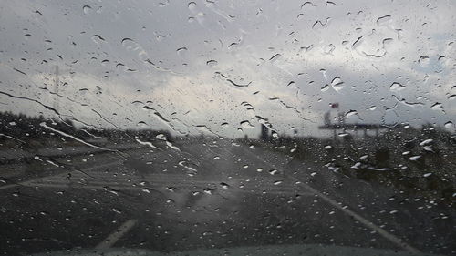 Full frame shot of wet window in rainy season