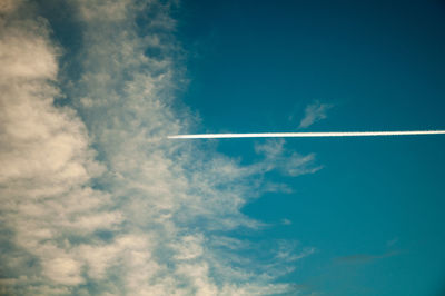 Low angle view of vapor trail in sky