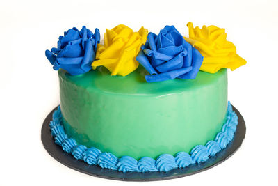 Close-up of multi colored pencils against white background