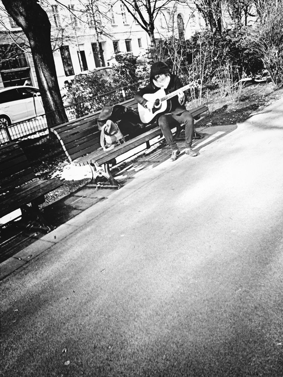 street, building exterior, built structure, tree, lifestyles, architecture, land vehicle, transportation, leisure activity, road, bicycle, shadow, full length, city, mode of transport, day, childhood, outdoors