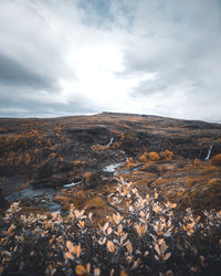 Scenic view of land against sky