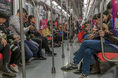 Group of people sitting in train