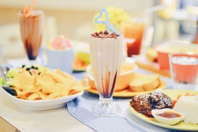 Close-up of fruits served in plate on table