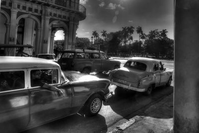 Cars on road against sky