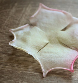 High angle view of rose on table