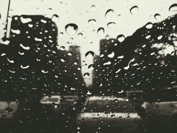 Close-up of water drops on glass