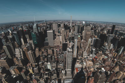 Cityscape against sky seen through empire state building