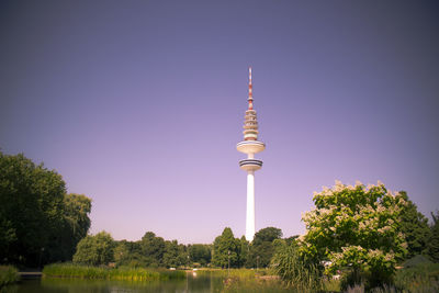 Communications tower against blue sky