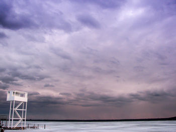 Scenic view of frozen lake against sky