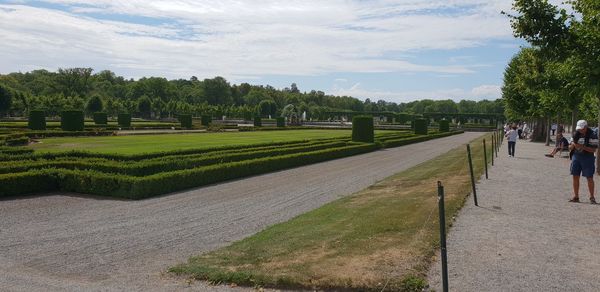 Panoramic view of green landscape against sky