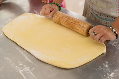 Midsection of woman preparing food