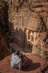 High angle view of people on rock