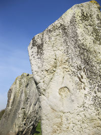 Low angle view of statue against sky