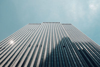 Low angle view of skyscraper against sky