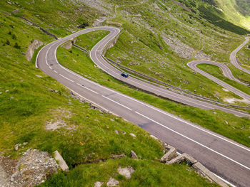 Winding road aerial view by drone. sibiu, romania. a great place to drive and stop during a trip.