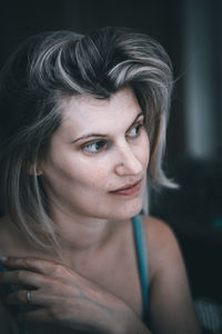 Close-up portrait of young woman